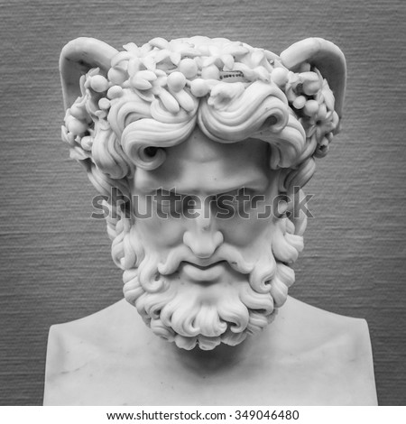 Head and shoulders detail of the ancient sculpture. Royalty-Free Stock Photo #349046480