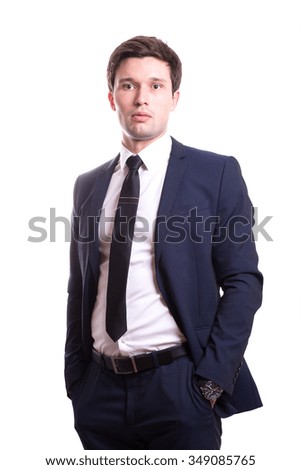 a handsome young man smiling pretty brunette in a dark business suit. Business portrait. business style. office. on a white background