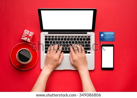 Top view of a Man buying christmas gifts online - online shopping concept. View from above with copy space