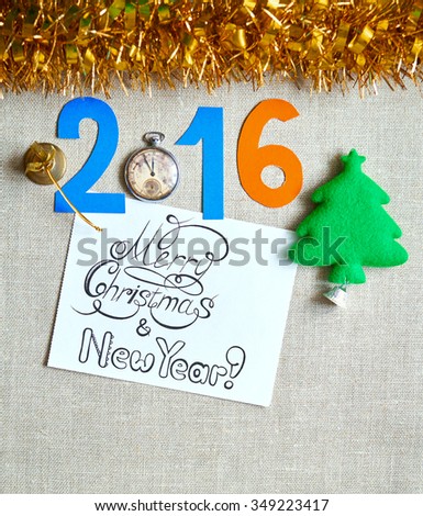 New Year background with Santa Claus, herringbone and other holiday decorations 