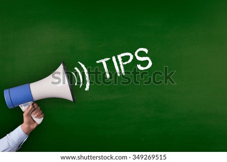 Hand Holding Megaphone with TIPS Announcement