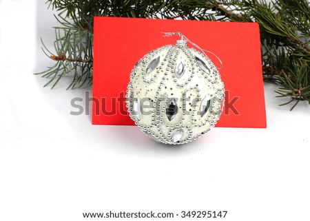 Christmas decoration with greeting card isolated on white
