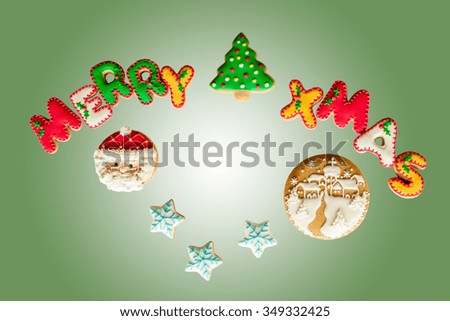 Merry Christmas gingerbread cookies. Handmade cake with beautiful letters and symbols 