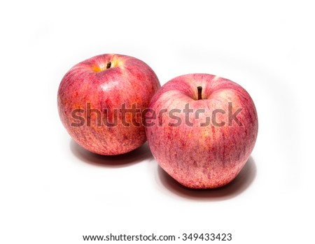 apple on wood isolated on white background