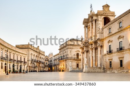 Ortigia in Syracuse in the Morning. Travel Photography from Syracuse, Italy on the island of Sicily. Cathedral Plaza. Large open Square at sunrise Royalty-Free Stock Photo #349437860