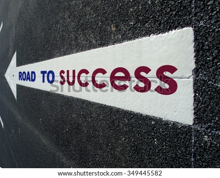 asphalt road arrow write road to success 