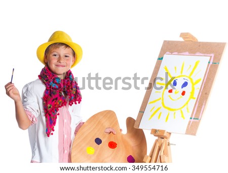 Little artist. Cute boy with watercolor painting, easel and palette, isolated on white background