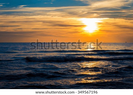 Yellow Sun Set in The Middle of The Ocean