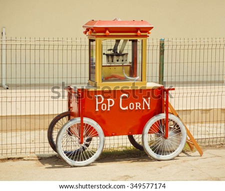 Popcorn machine made in vintage style, with sign Pop Corn on it front