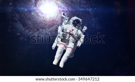 Astronaut in outer space. Elements of this image furnished by NASA.