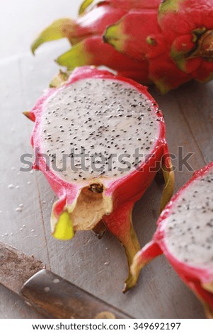fresh sliced dragon fruit on chopping board