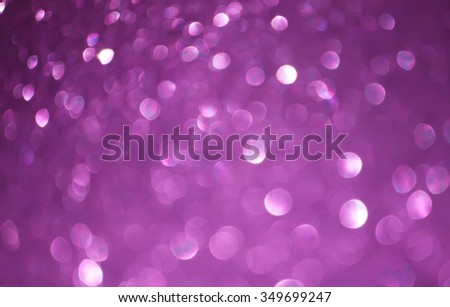 Glitter bokeh abstract purple background.