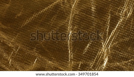 texture of crumpled foil gold