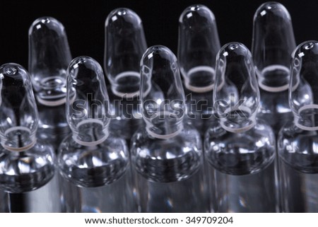 Photo medical ampoules on a black background
