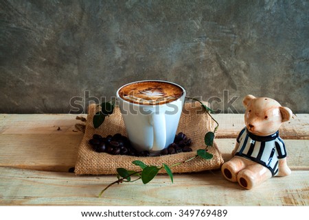 Picture of coffee cup merry x' mas top view on old wooden
