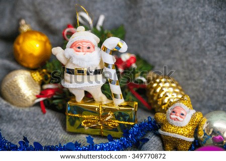 Christmas background: Santa Claus toy and garland