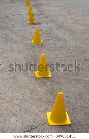 Orange traffic cone on ground