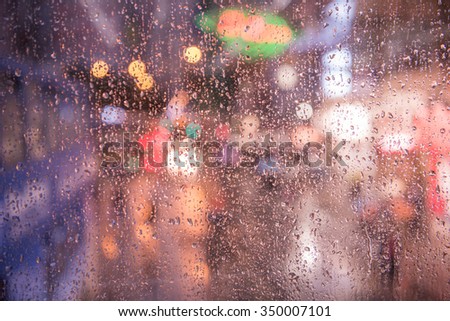 beautiful out of focus Rain drop and bokeh on a Road