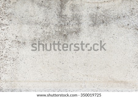Worn grey cement stone wall background texture