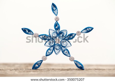 Paper snowflakes made with quilling technique - macro details