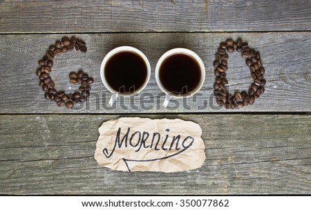 "good morning" concept - coffee beans, Cup of black coffee. Toned image.