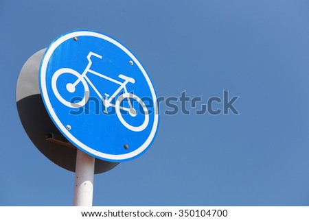 Blue round bicycle sign
