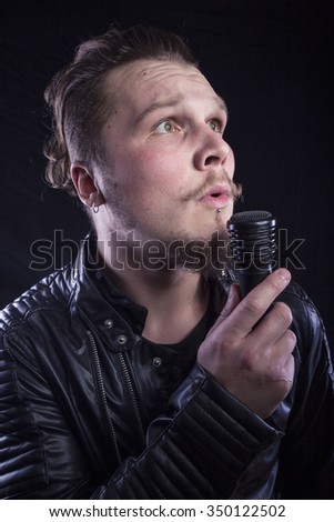 Man singing with microphone
