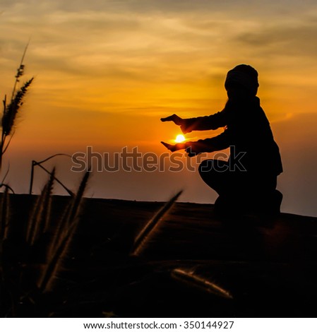Traveller posed as the sunset on hand