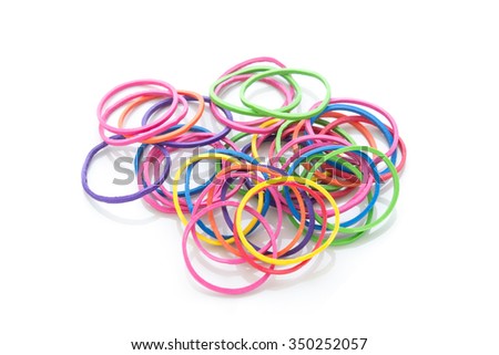 colorful rubber bands on white background