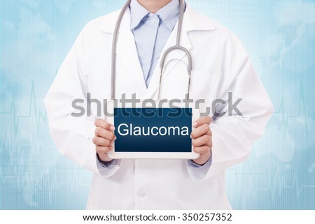 Doctor holding a tablet pc with Glaucoma sign on the display