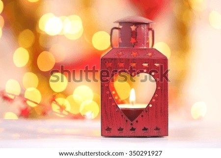 Red Christmas lantern. Bokeh background golden light.