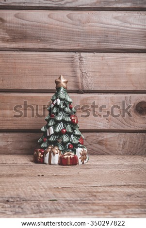 Christmas tree on a wooden background