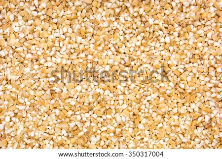 close up shot of split corn seeds background Royalty-Free Stock Photo #350317004