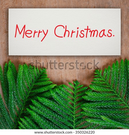 Merry Christmas on white paper. Christmas concept.