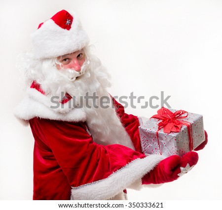 Santa Claus with gifts on white background. Isolated