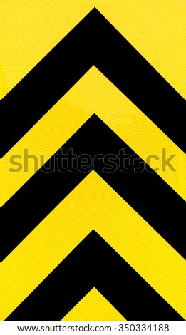 Yellow and black arrow background