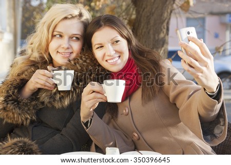selfie  of young beautiful girls on the phone