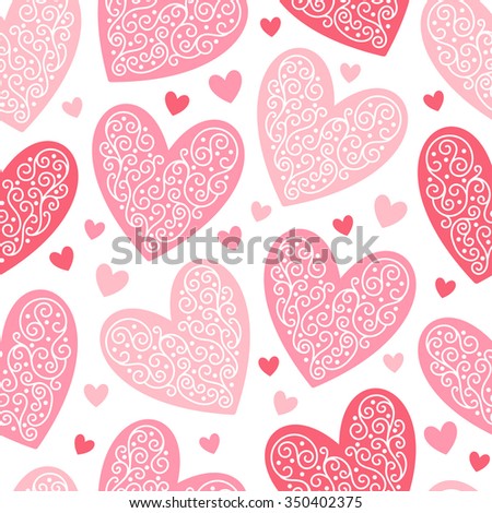 Valentines day background. Seamless pattern made of ornamental hearts of various size. Shades of red. Hearts pattern with lacy ornamentation.