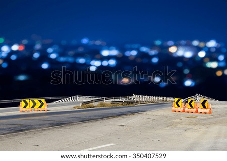 bridge with  blur bokeh light in city background