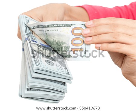 Dollars in hand on a white background
