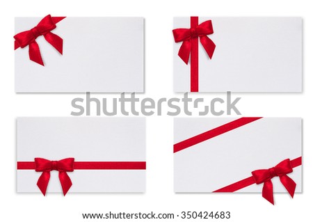 White paper card with a red bow on a white background. Greeting card.