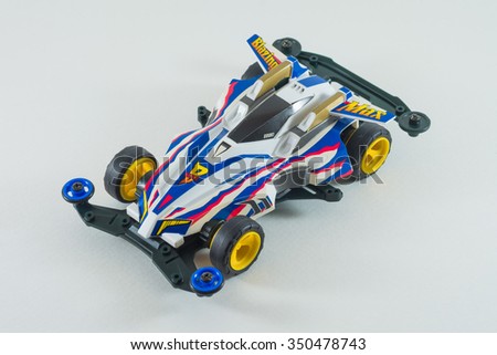 Four-wheel drive Car toy called Tami ya Car.