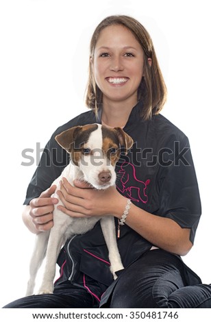 jack russel terrier and woman in front of white background