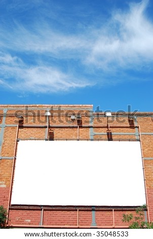 blank billboard announcement on a brick building