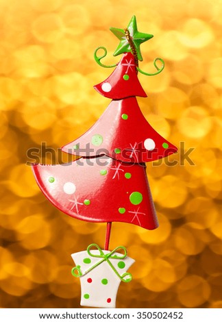 Christmas tree toy decoration with a gift