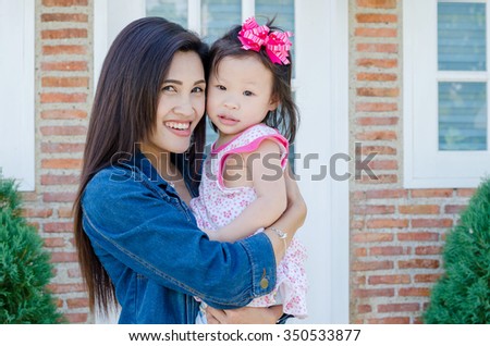 Beautiful Asian mother with her daughter