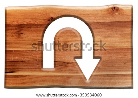 U-turn sign cut in wooden board isolated on white. Natural oak wood. Background, texture