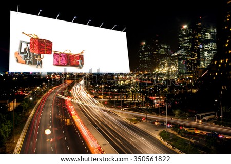 billboard blank for outdoor advertising poster at night time for advertisement street light . with Christmas decoration billboard.