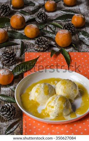 Ice cream with tangerine sauce   