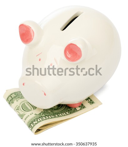 Piggy bank with dollars on isolated white background
